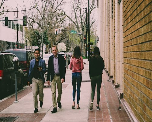People walking casually on a city street